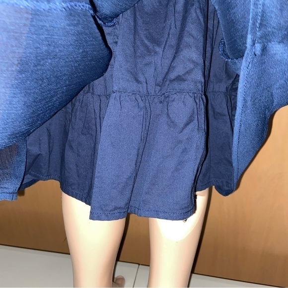 Guess Los Angeles baby lace dress has a gauze skirt just perfect for twirling. - Picture 5 of 8